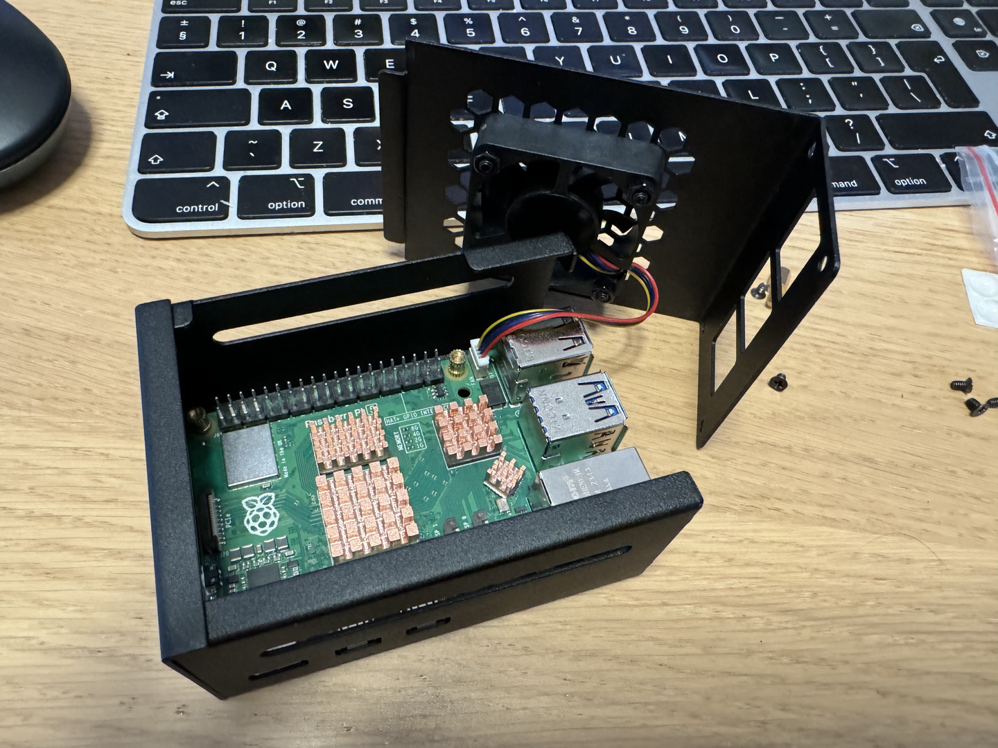 Raspberry Pi 5 setup with metal case active cooling and 7" touchscreen